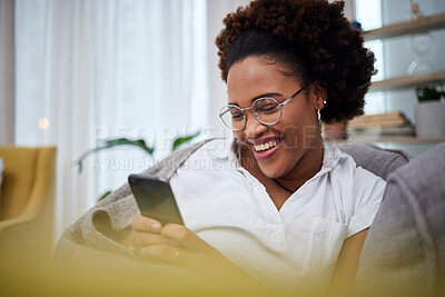 Buy stock photo Laughing, meme and woman with phone on a couch using the internet, web and search on social media for joke. Online, smartphone and person relax on a sofa with mobile connection or online shopping