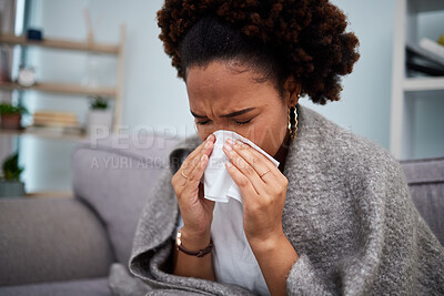 Buy stock photo Sick, couch and woman in a blanket with flu at home, house or apartment with a cold, fever and blowing nose. Virus, sad and female person with a tissue ill on sofa in a lounge with a medical problem