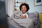 Laptop, coffee and black woman with blanket on sofa laughing for comedy, funny and comic movies. Happy, home and female person relax with computer for entertainment, streaming and watching film