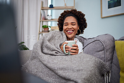 Buy stock photo Laptop, coffee and woman with blanket on sofa laughing for comedy, funny and comic movies. Happy, home and African female person relax with computer for entertainment, streaming and watching film