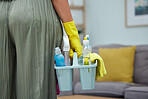 Cleaning, house and hands of woman with detergent, disinfectant and spray bottle for housekeeping, hygiene and sanitation. Housekeeper, maid and product to wash or clean home and living room