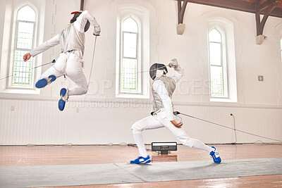 Buy stock photo Fencing, jump and sport with sword to fight in training, exercise or workout in a hall. Martial arts, stab and fencers or people with mask and costume for fitness, competition or target in swordplay