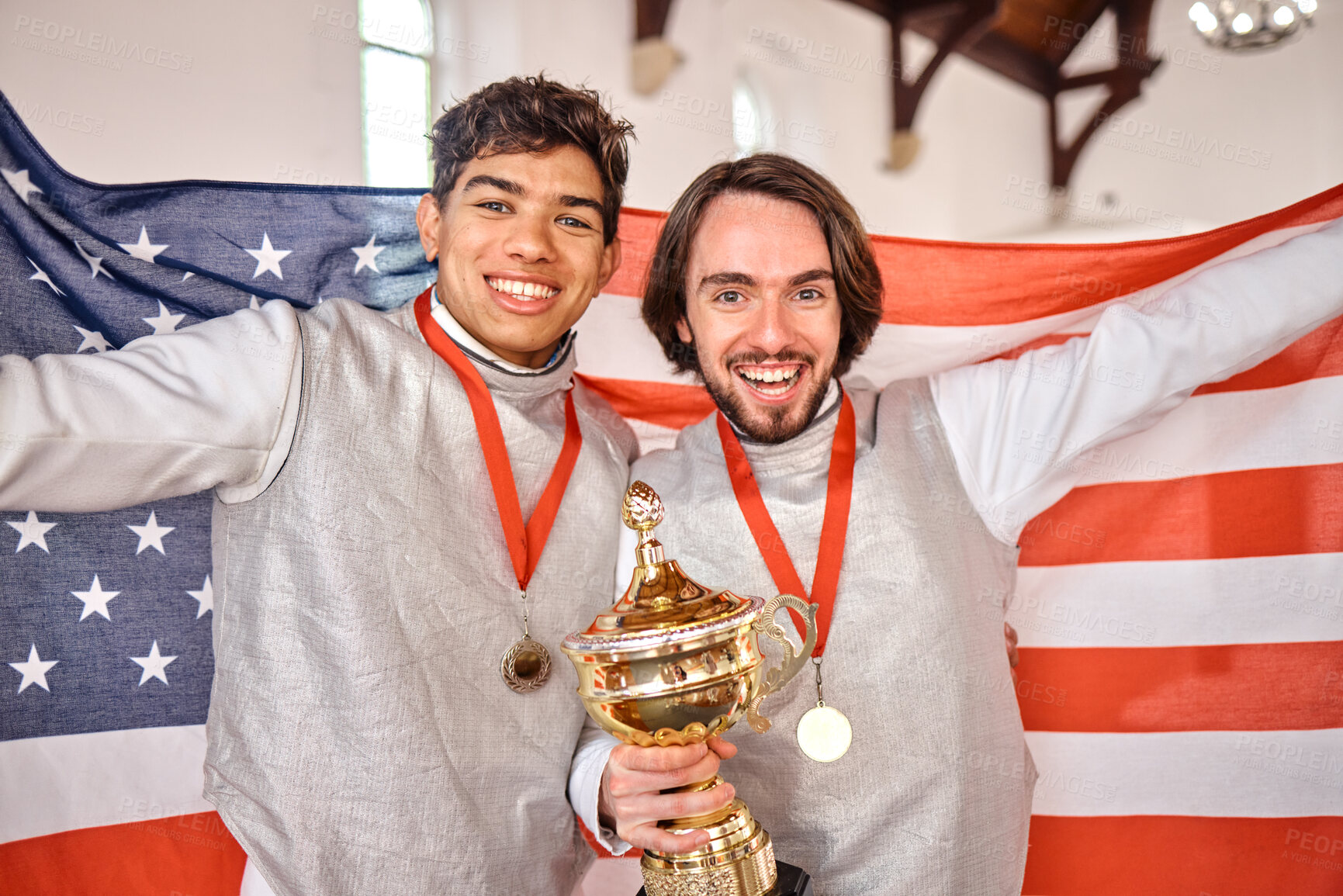 Buy stock photo Trophy, sports and portrait of men with American flag, winning at competition and happy games. Smile, performance award and gold medal winner team on podium for celebration of success at challenge.