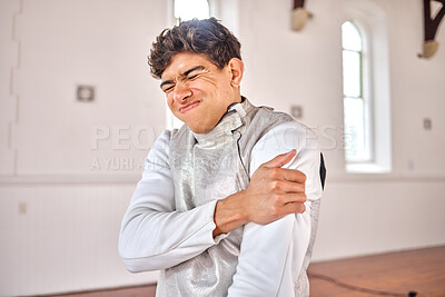 Buy stock photo Fencing, man and shoulder pain, injury or accident after training, exercise or workout in club. Fencer, body problem and athlete with arthritis, fibromyalgia or osteoporosis, wound and emergency