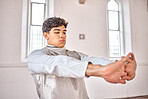 Sports, fencing and man stretching for exercise, training and workout for competition in studio. Fitness, sword fighting and male person warm up arms getting ready for challenge, match and practice