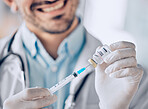 Man, doctor and hands with syringe for vaccine, healthcare or medication for injection at hospital. Closeup of male person or medical professional with needle for dose, diagnosis or drugs at clinic