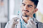 Man, doctor and syringe with vial for cure, healthcare or medication for injection at the hospital. Male person or medical professional holding needle for dose, diagnosis or drugs at the clinic