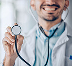 Man, doctor and hands with stethoscope for heart beat, checkup or consultation at the hospital. Closeup of male person, nurse or surgeon with medical tool for monitoring or listening at the clinic