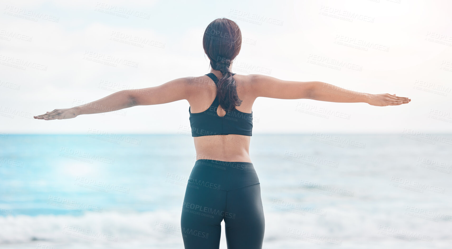 Buy stock photo Fitness, freedom and woman back at the beach stretching arms after running or cardio routine in nature. Exercise, rear view and female at the ocean with body stretch for training success or milestone