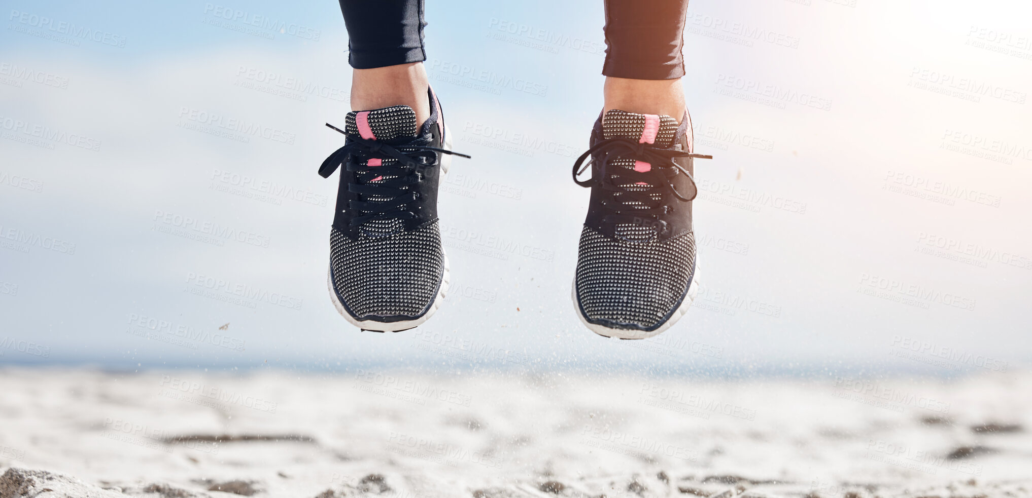 Buy stock photo Woman, fitness and shoes jumping on mockup in air for sports motivation, running or outdoor exercise. Closeup of female person, athlete or runner feet jump in workout for healthy wellness or training