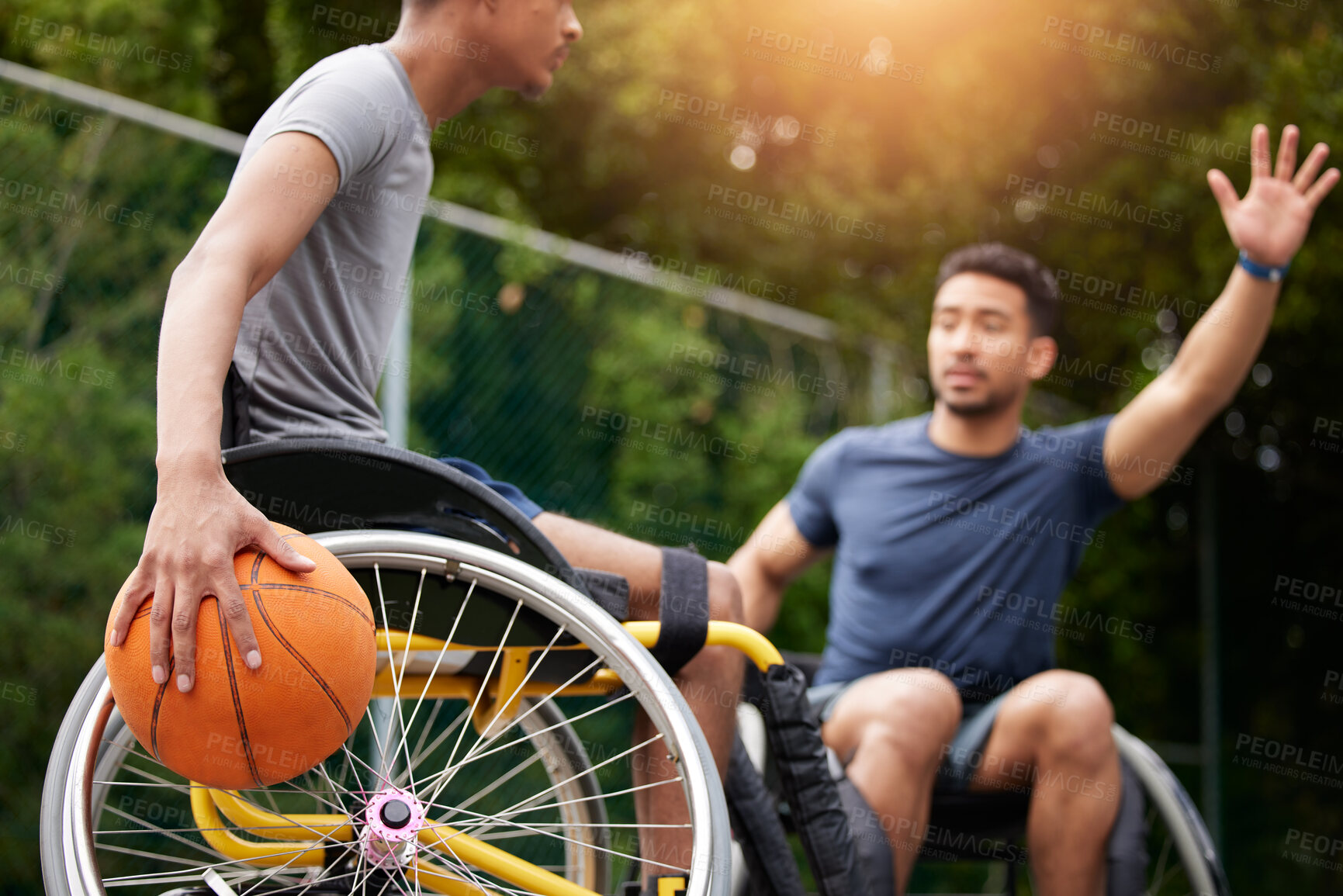 Buy stock photo Sports game, wheelchair basketball player and people playing match competition, challenge or practice skills. Outdoor action, opponent and fitness athlete with disability, training and exercise
