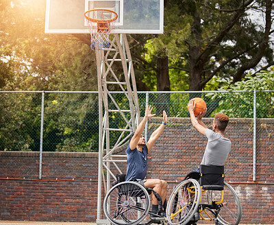 Sports, wheelchair basketball shot and people practice target, goal or hoop shooting in match competition. Player aim ball, rival challenge and outdoor workout, fitness and athlete with disability
