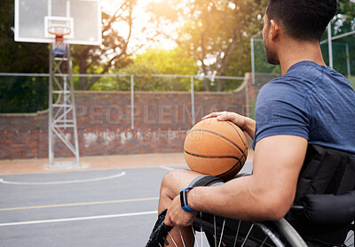 Buy stock photo Sports, basketball court and man focus in wheelchair for playing competition, games and shoot outdoors. Fitness, wellness and male person with disability with ball for training, workout and exercise