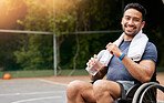 Basketball player, portrait and athlete in wheelchair drinking water for sports break, rest and fitness electrolytes. Person with a disability, Asian man and bottle for workout recovery on court