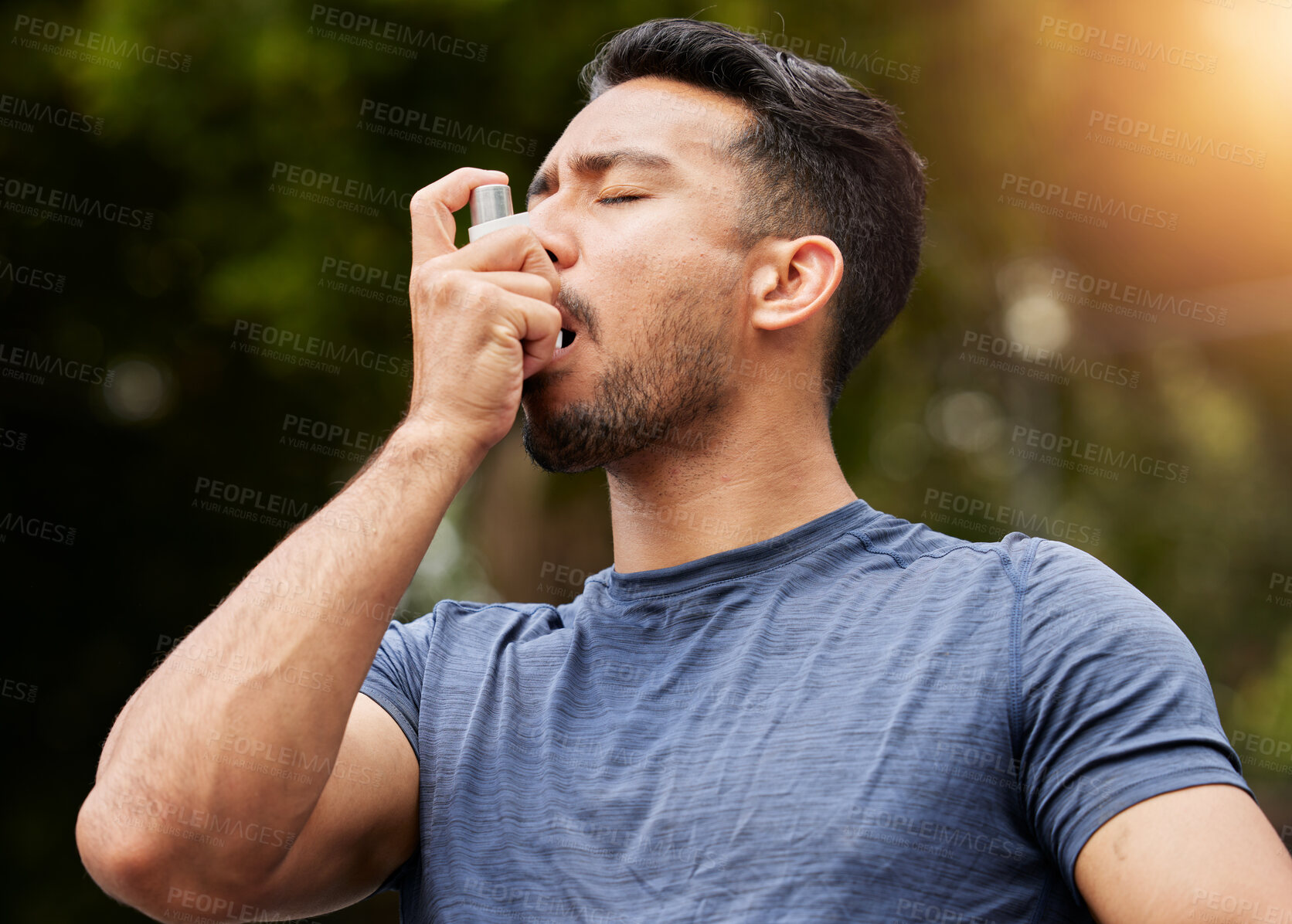 Buy stock photo Man, breathe or asthma pump outdoor in park for help with health risk, cough treatment and air for exercise. Asian male runner, spray and medicine inhaler in nature for lungs, oxygen and wellness

