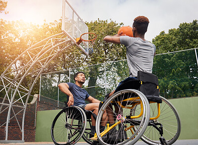 Buy stock photo Wheelchair basketball player, shot and sports people play match competition, challenge or practice game skills, target or goal. Outdoor court, shooting workout and athlete with disability, training