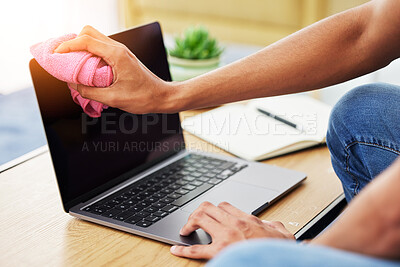 Buy stock photo Hygiene, laptop and closeup of man cleaning his screen to prevent dust, dirt or germs at his desk. Technology, health and male person wipe computer with a cloth for sanitizing or disinfection at home