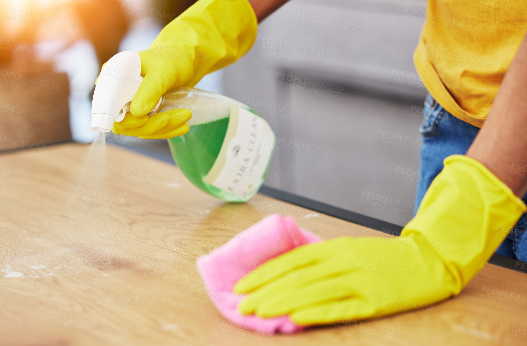 Buy stock photo Table, spray and hands cleaning in a home for hygiene, germ protection and maintenance with a chemical in a house. Bacteria, service and housekeeper or cleaner working on a wood desk with gloves