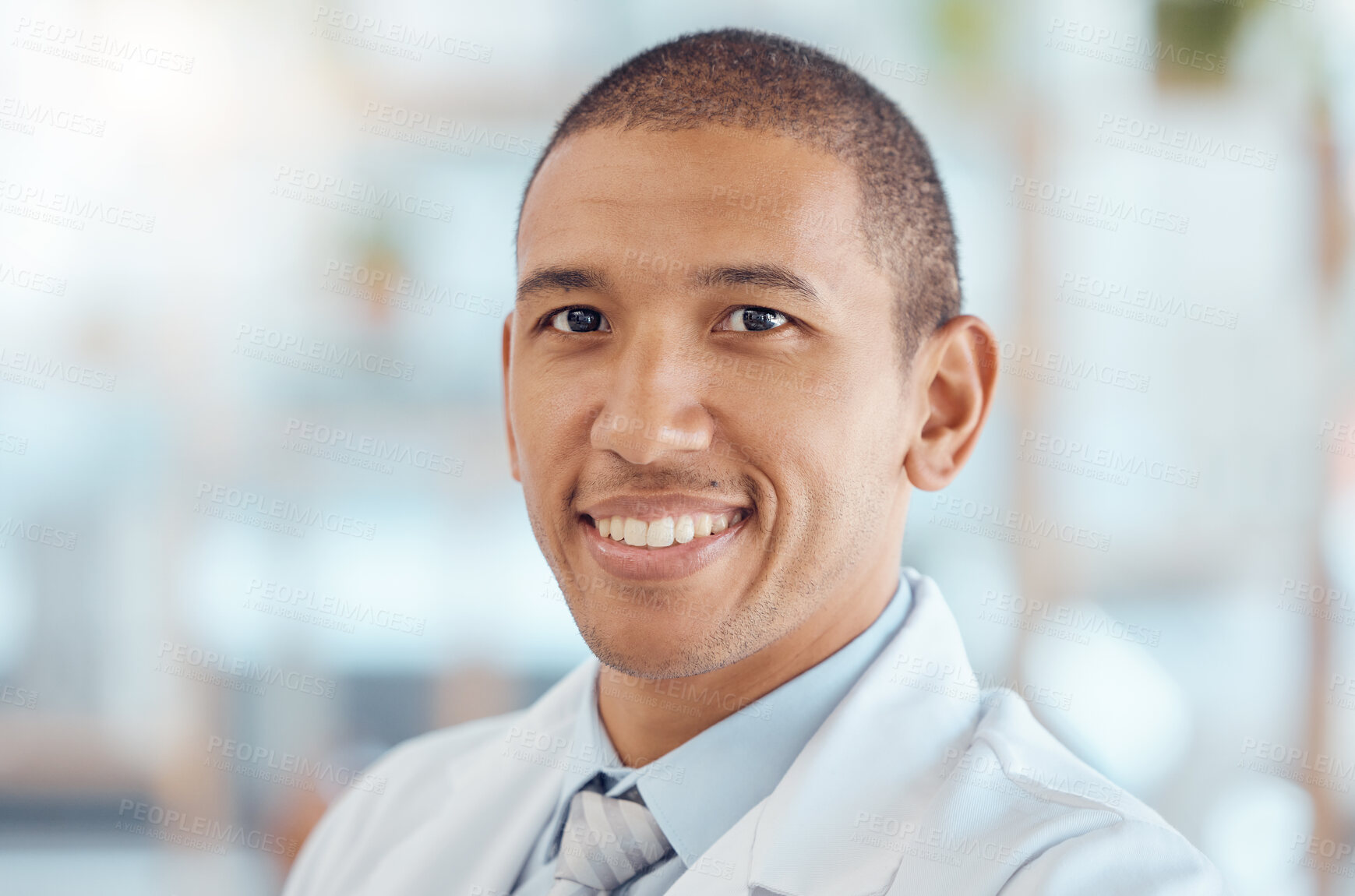 Buy stock photo Doctor, portrait and man with smile in office, healthcare and confidence at hospital with trust, support and help. Face of happy medical professional, expert in medicine and career in health care.