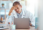 Headache, doctor and man at laptop in medical office with burnout challenge, clinic problem and stress. Frustrated healthcare worker at computer with fatigue, migraine pain and anxiety of 404 mistake