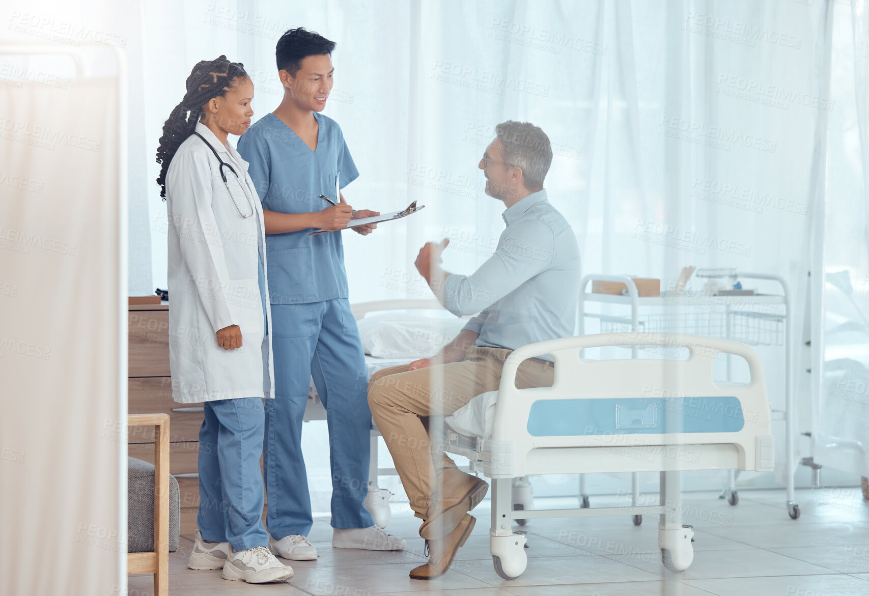 Buy stock photo Doctors, nurse and healthcare people consulting, advice or consultation with patient on medical checkup, exam or health services. Surgeon, assessment and clinic staff support, wellness or medicare