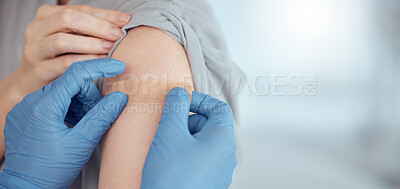 Buy stock photo Doctor, arm and plaster on patient for vaccine in healthcare clinic, virus protection and wellness services. Closeup hands of nurse with medical bandage for safety, risk or immunity with mockup space