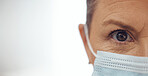 Healthcare, portrait and woman with mask, mockup banner and safety for doctor in hospital on white background. Ppe, face and eyes of medical professional, rules and compliance working in clinic space