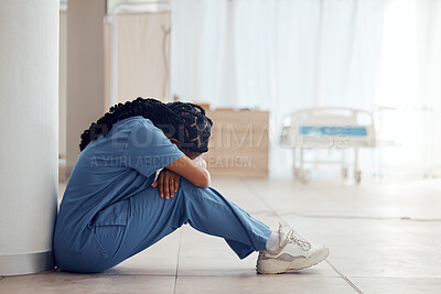 Buy stock photo Healthcare, woman on the floor and stress with depression, intern and panic attack with burnout. Person, medical professional or sad nurse on the ground, mental health issue and anxiety in a hospital