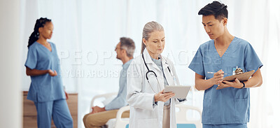 Buy stock photo Teamwork, doctor or surgeon with tablet planning in hospital meeting or discussion for collaboration together. Leadership, help or nurses talking or speaking of healthcare research, report or news 