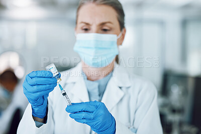 Buy stock photo Woman doctor in mask, needle and covid vaccine bottle for hospital laboratory research. Healthcare, medicine and medical professional with sample syringe for corona vaccination in pharmaceutical lab.
