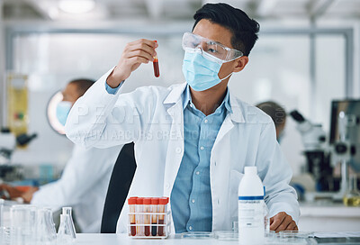 Buy stock photo Test, blood sample and scientist doing research with face mask in a laboratory for medical analysis in a lab. Science, medicine and professional Asian man working on exam of DNA in a vial tube