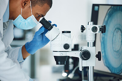 Buy stock photo Microscope, science and man with mask on face in laboratory to review particles, medical test and biotechnology. Scientist, microbiology and investigation of innovation, dna analysis and development