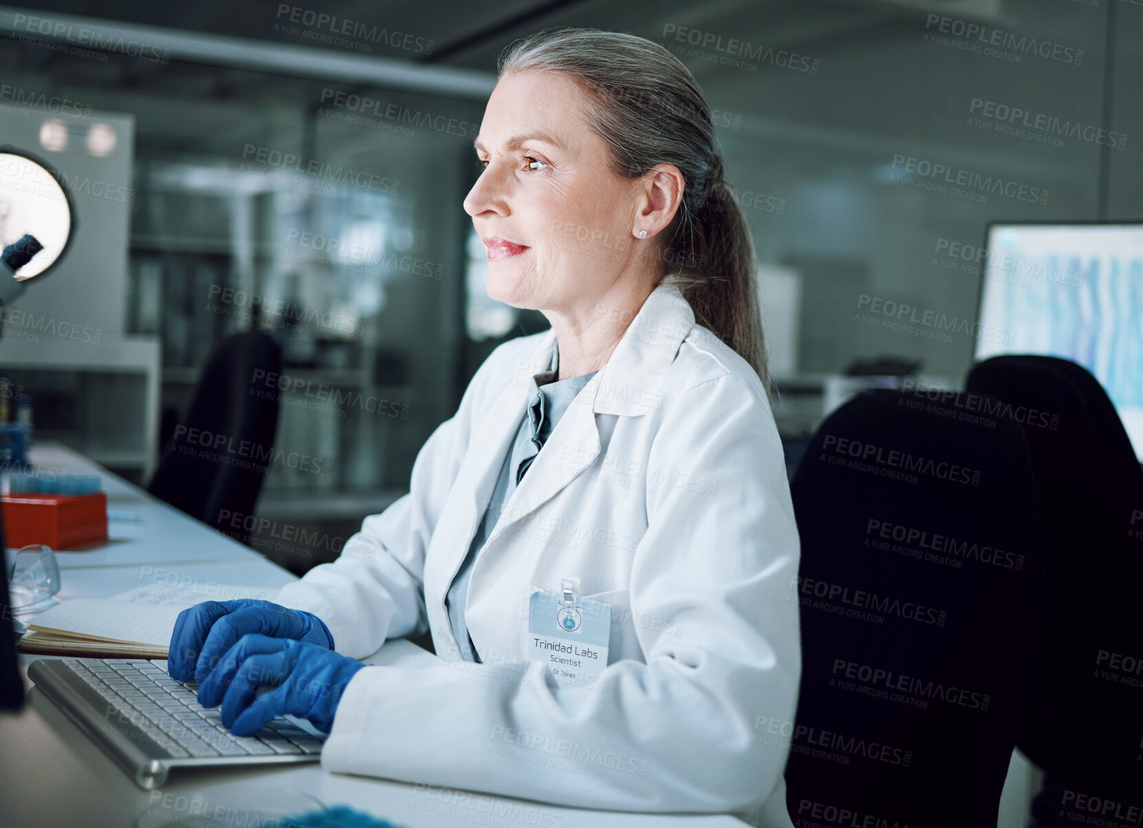 Buy stock photo Woman, night and keyboard in science laboratory for medical research, deadline and pharmacy wellness. Mature scientist, person and working late on technology for DNA healthcare or genetic engineering