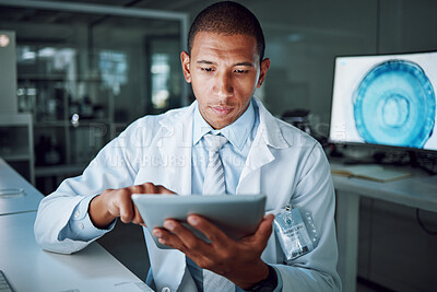 Buy stock photo Man, night or tablet in science laboratory for medical research, deadline or pharmacy wellness. African scientist, person or working late on digital technology, DNA healthcare or genetic engineering