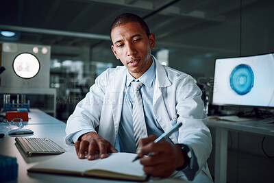 Buy stock photo Doctor, writing and night in laboratory for medical research and study for healthcare report. Paperwork, African male professional and planning with data for biotechnology in a clinic or hospital