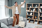 Headphones, senior or happy woman dancing to music or streaming to relax with freedom at home. Retirement, smile or excited mature person listening to a radio song or audio on an online subscription