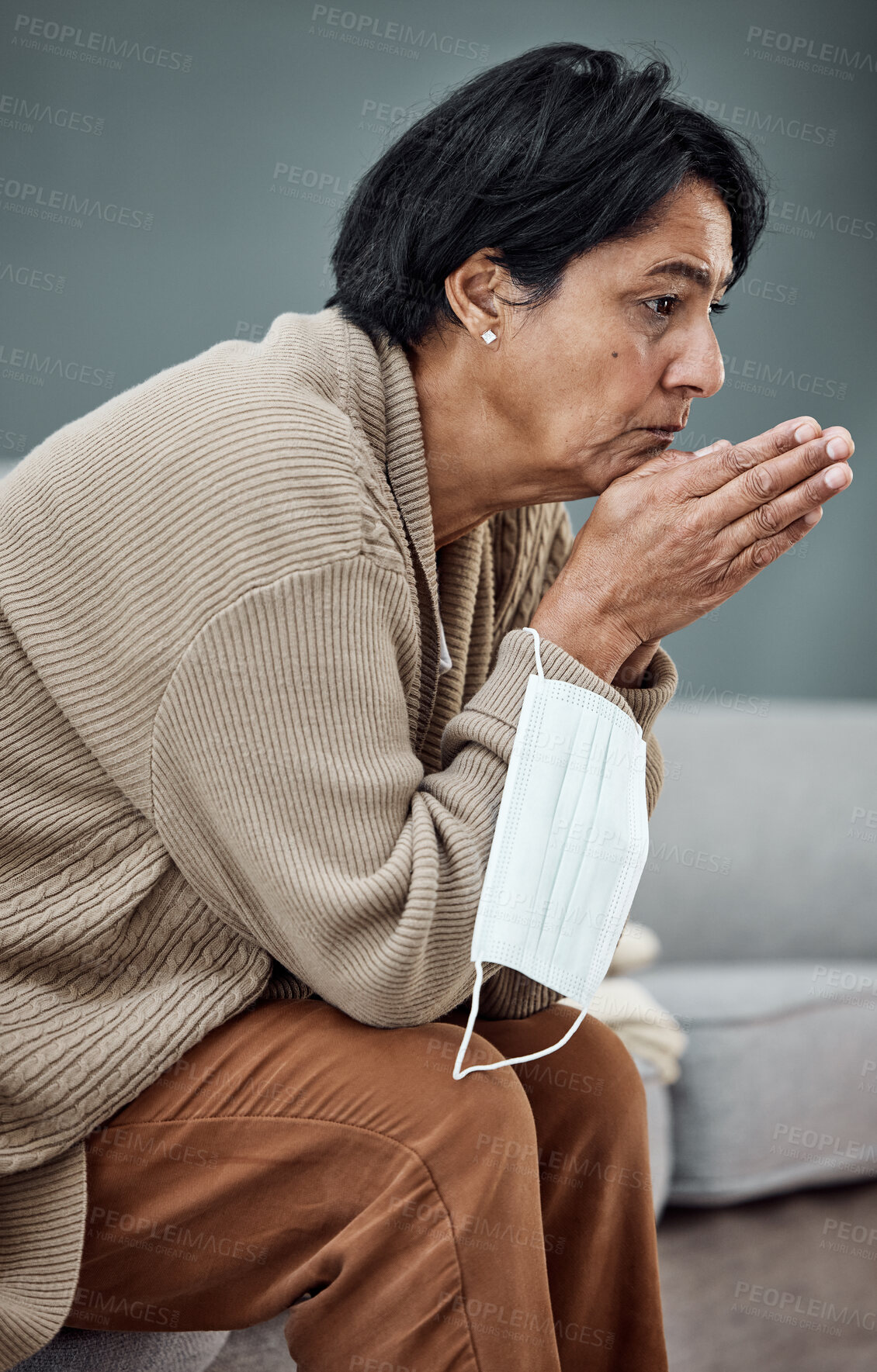 Buy stock photo Sad, thinking and senior woman on sofa with depression or mental health in a home. Covid, anxiety or an elderly sick person on the living room couch with an idea or retirement fatigue in the morning