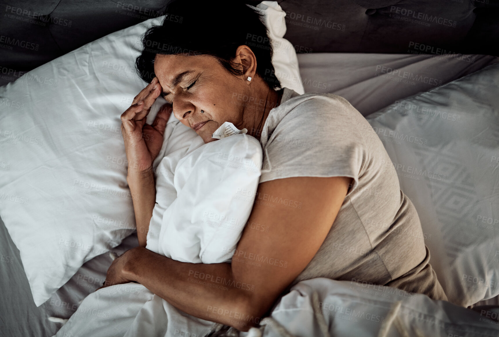 Buy stock photo Headache, stress and senior woman in bed from above with depression, insomnia or menopause. Anxiety, migraine and top view of old lady with vertigo, trauma or mental health, problem or bedroom crisis