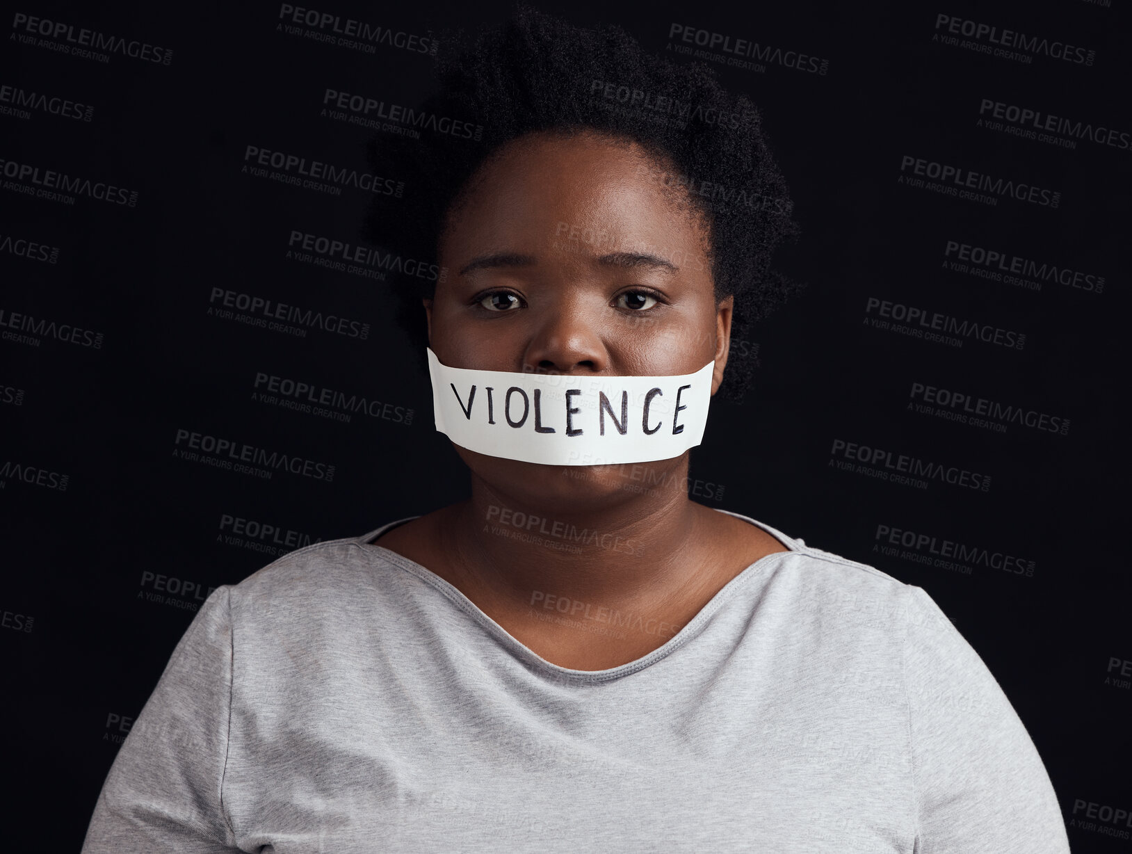 Buy stock photo Portrait, censorship and a black woman in protest of domestic violence on a dark background. Freedom, gender equality or empowerment with a serious young female person in studio for human rights