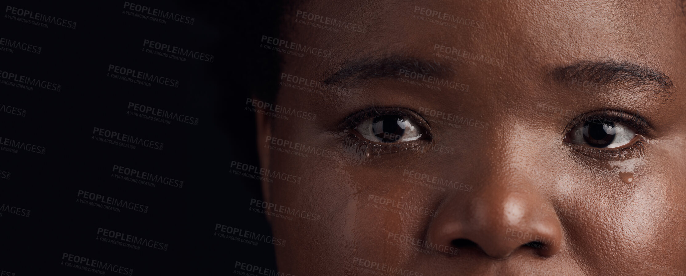 Buy stock photo Black woman, eyes and mental health, crying with depression and crisis with abuse on dark background. Sad, portrait and anxiety, depressed female person with face on banner and grief in studio