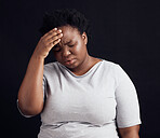 Sad black woman, headache and stress in studio of anxiety, trauma problem or worry on dark background. Frustrated, confused and depressed model with burnout, brain fog or fear, pain and mental health