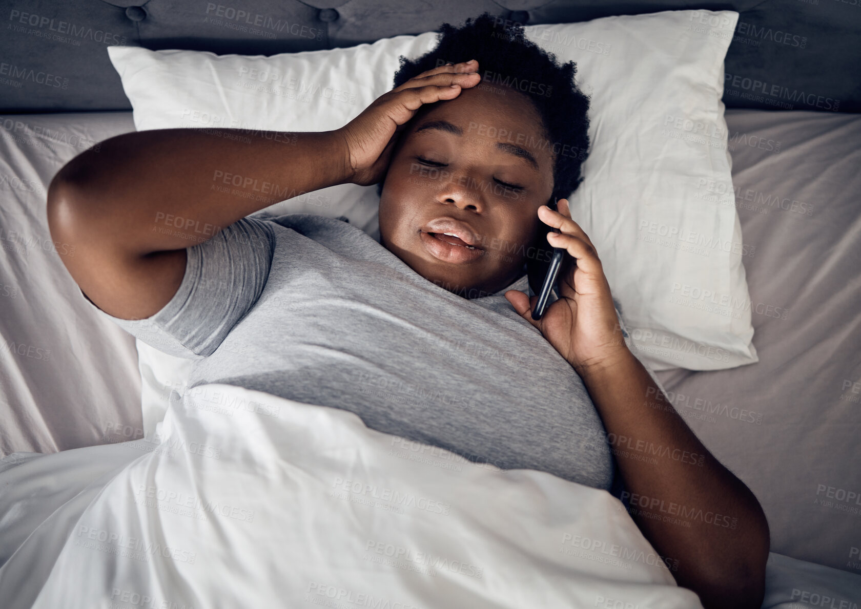 Buy stock photo Insomnia, night and black woman in bed on a phone call talking or speaking of death or problems at home. Stress, upset or sad person in conversation or discussion with mobile communication in bedroom