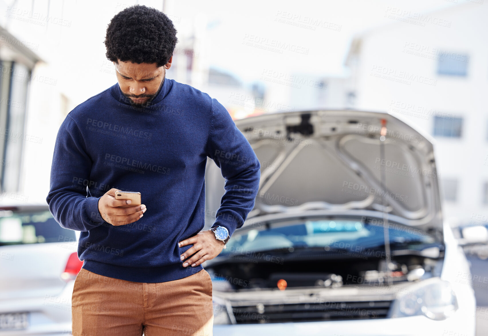 Buy stock photo Black man with phone, car breakdown and typing in road with contact, auto insurance and travel. Motor problem, transport and frustrated driver on road checking mobile app for engine repair service.