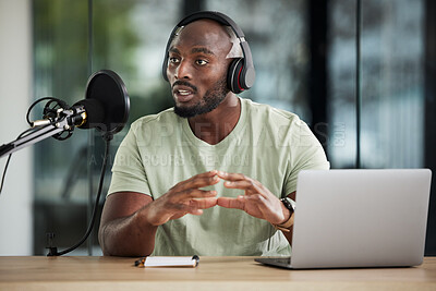 Buy stock photo Black man, microphone and talking with headphones and radio DJ, news with communication and audio equipment. Podcast, laptop and multimedia with male presenter, hosting show and online broadcast