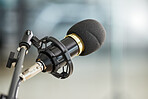 Background, closeup and microphone for podcast, radio interview and audio in recording studio. Sound gear, voice over production and broadcast of talk show, live stream communication and music media