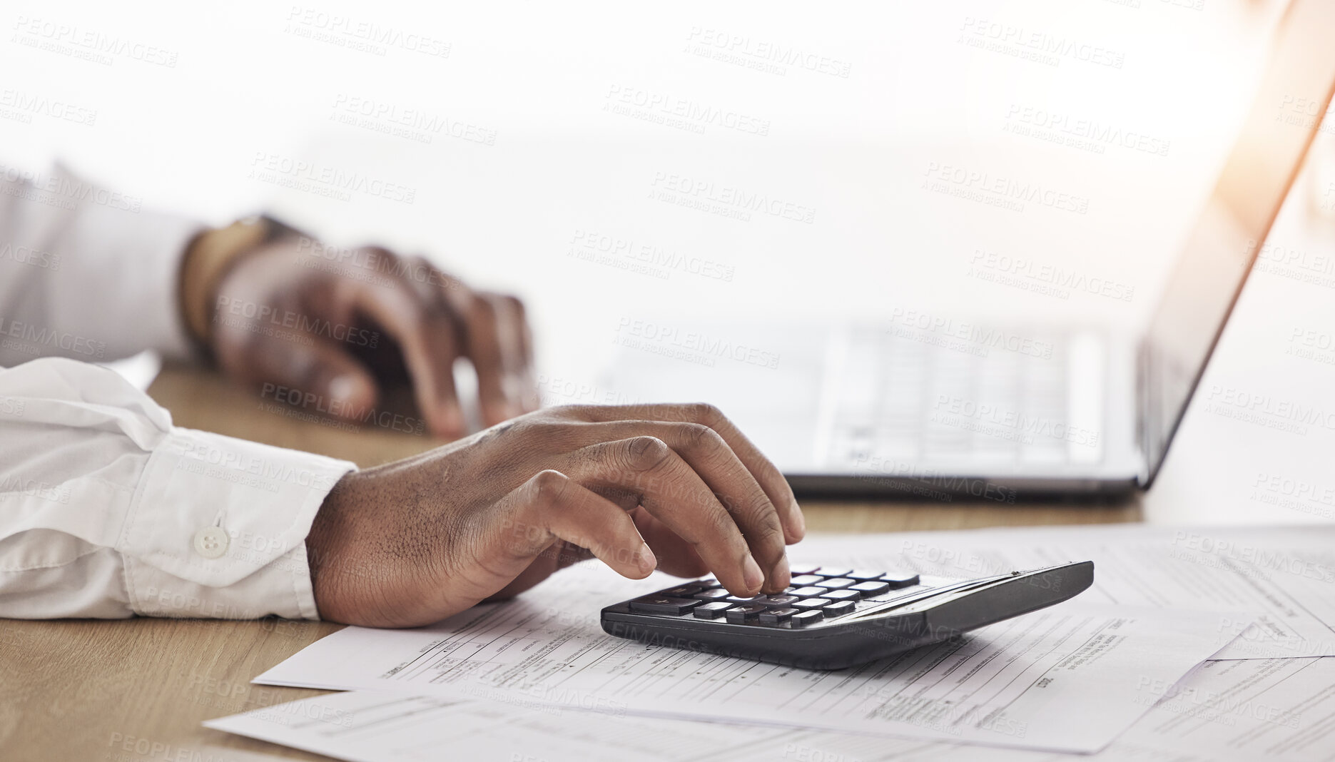 Buy stock photo Person, hands and calculator, computer and documents for financial planning, taxes management and business debt. Accountant typing numbers for budget, bookkeeping math and audit paperwork on laptop