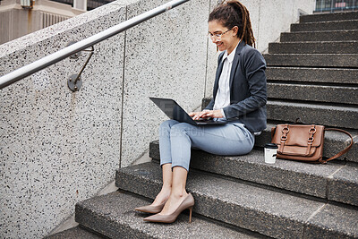 Buy stock photo Business woman, stairs and typing on laptop, planning schedule and thinking with ideas, copywriting or city. Young entrepreneur, smile and sitting on steps with computer for remote work in metro cbd
