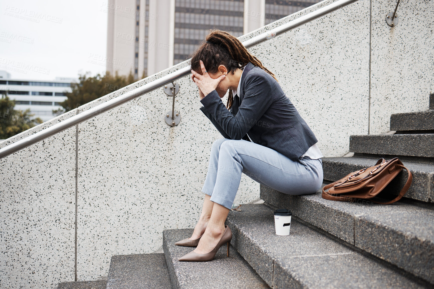 Buy stock photo Sad, stairs and business with woman in city for unemployment, job loss and depression. Problem, stress and fear with female employee  thinking in outdoors for mental health, frustrated and failure 