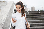 Walking, phone and happy woman texting in a city for travel, chatting or commute outdoor. Smile, social media and female chatting, reading or checking email, app or online communication on town walk