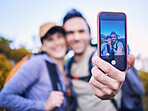 Hiking, nature and couple with selfie on screen for adventure, holiday and journey on mountain. Travel, dating and happy man and woman take picture on phone to explore, trekking and backpacking